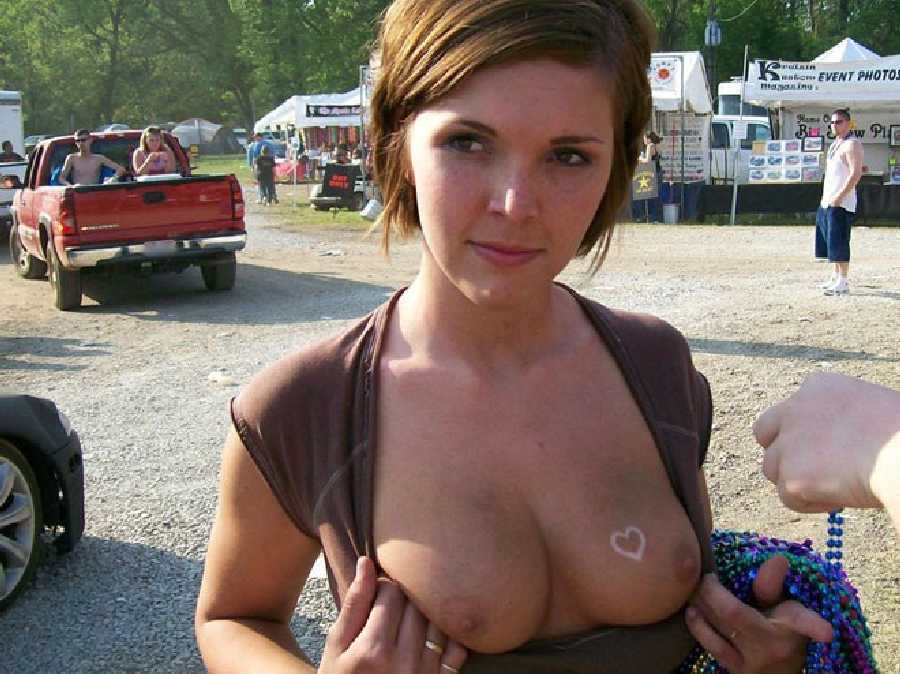 Showing Boobs image