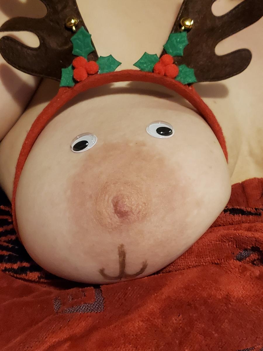 Mature Wife with Reindeer Antlers on her Boob